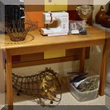F28. Sewing table. 29”h x 48”w x 24”d 